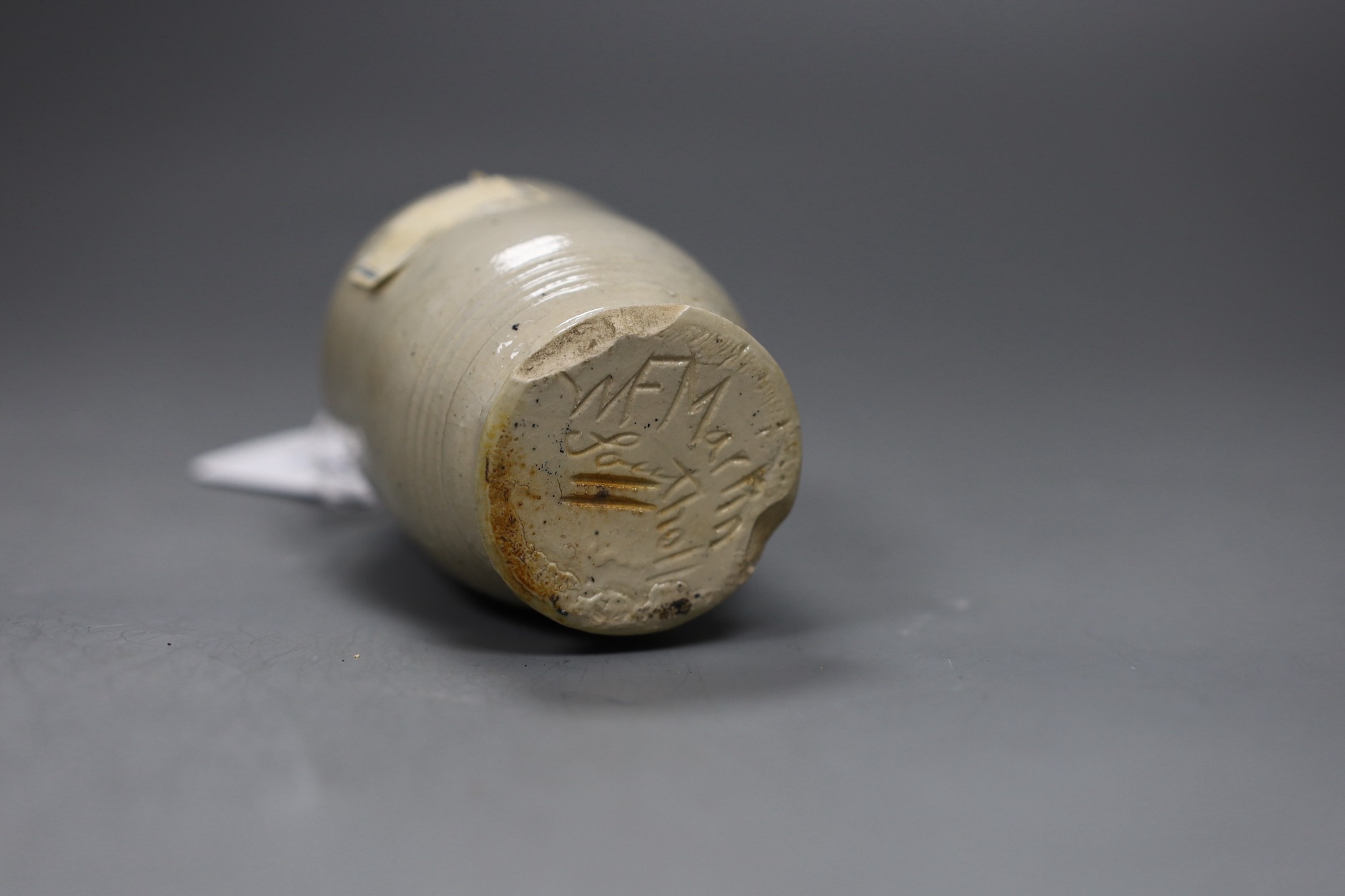 A Martin Brothers cream glazed vase, incised mark, 10.5cm tall